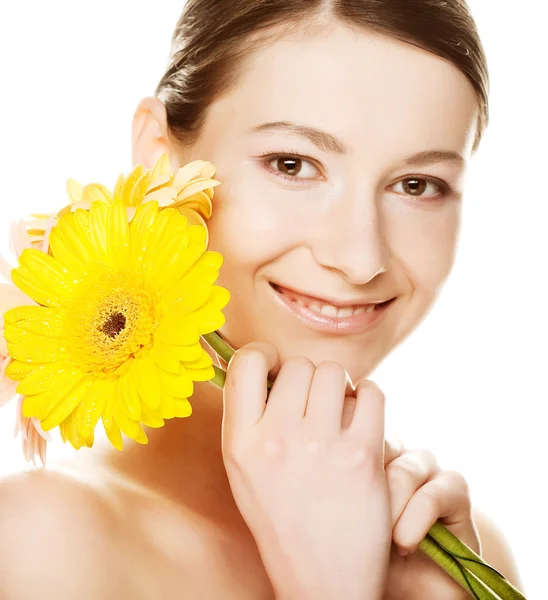 Young woman with gerber flower — Stock Photo, Image