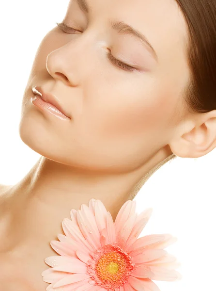 Young woman with gerber flower — Stock Photo, Image