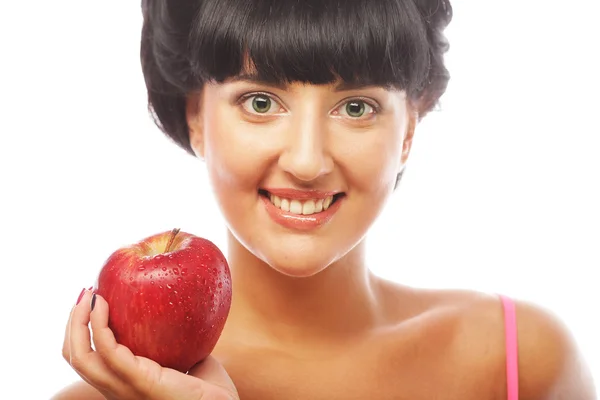 Young brunette woman with red apple — Stock Photo, Image
