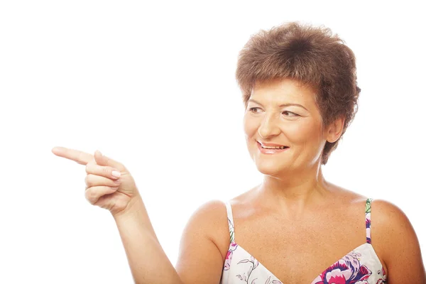 Mature Woman pointing — Stock Photo, Image