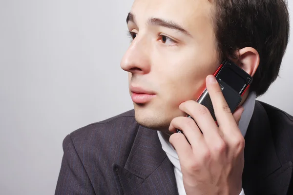 Young business man making a phone call — Stock Photo, Image