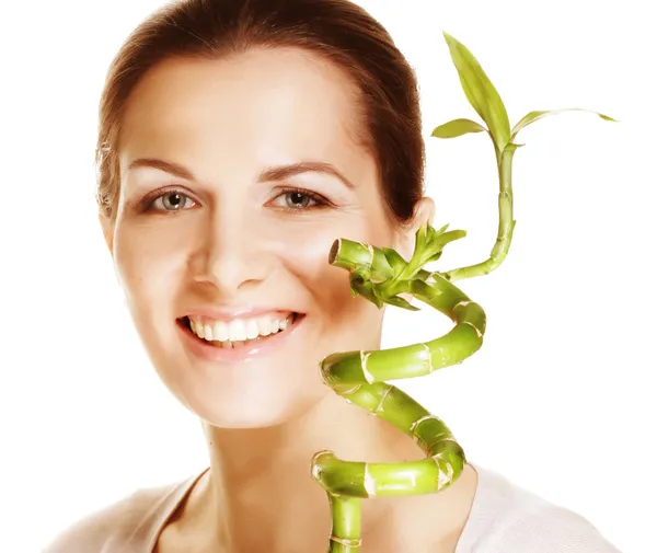 SPA. young woman with bamboo. — Stock Photo, Image