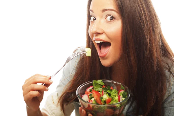 Young happy woman eating salad. — Stock Photo, Image