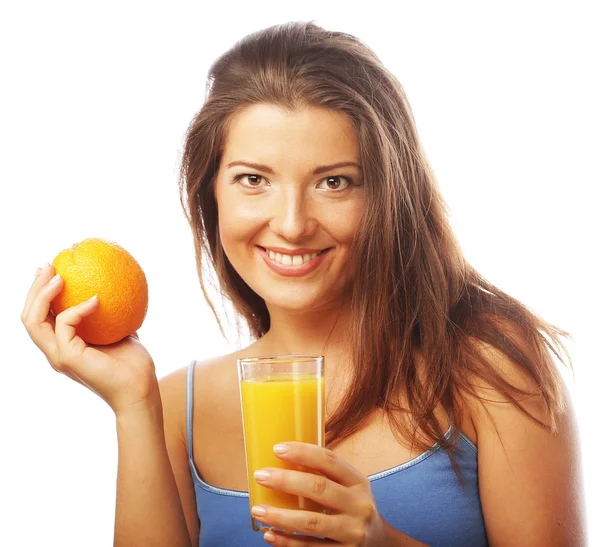 Woman holding orange juice Stock Picture