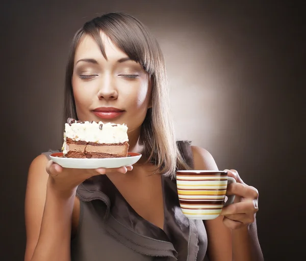 Donna con caffè e dessert — Foto Stock