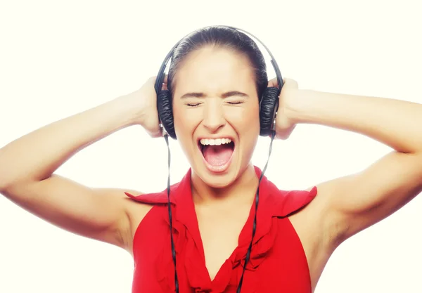 Mulher dançando à música com fones de ouvido — Fotografia de Stock