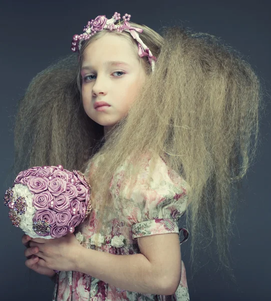 Little lady with bouquet — Stock Photo, Image