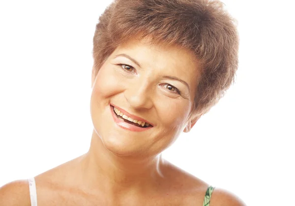 Egy érett nő, mosolygós részlete Stock Kép