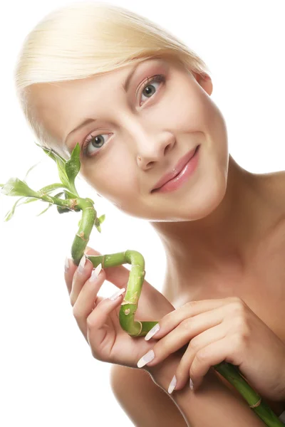 Beautiful woman with bamboo — Stock Photo, Image