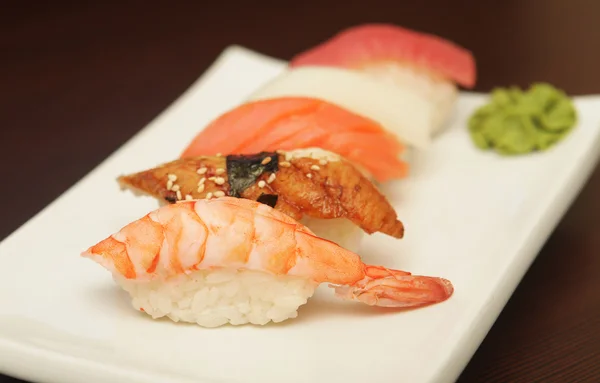 Sushi on a white plate. — Stock Photo, Image