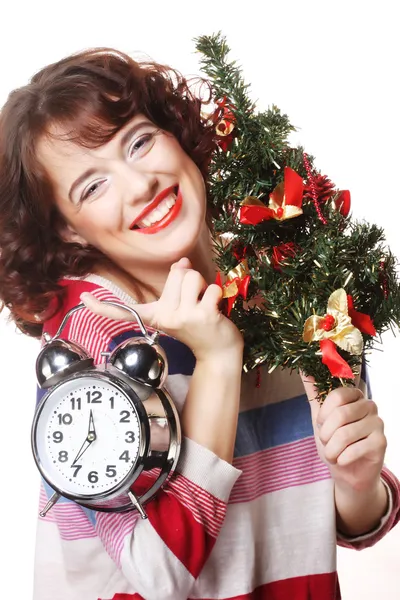 Woman holding clock and the tree — Stock Photo, Image