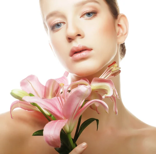 Young beautiful woman with a lily flowers. — Stock Photo, Image