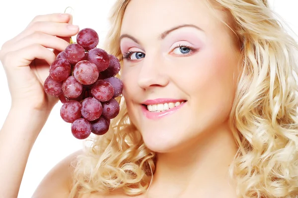 Jonge blonde vrouw met druivenmost — Stockfoto