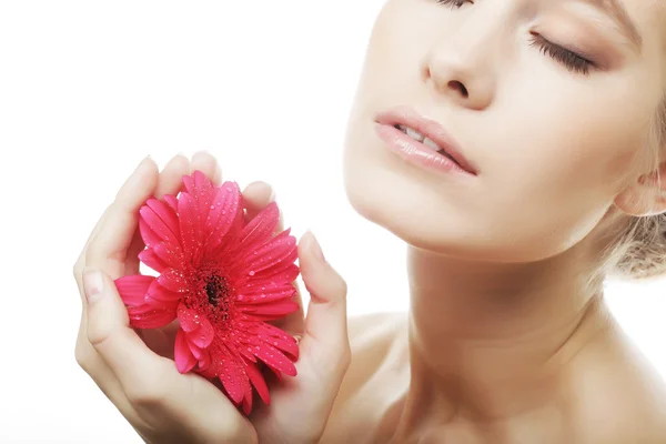 Beautiful young woman with gerber flower — Stock Photo, Image