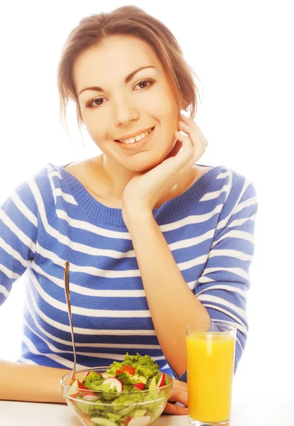 Mujer joven desayuna — Foto de Stock