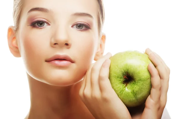 Head shot of woman holding apple — Stock Photo, Image