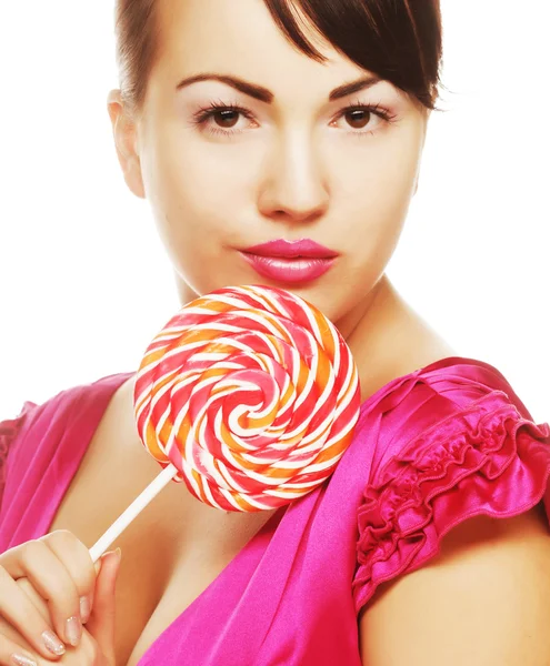 Pretty woman with lollipop. over white background. — Zdjęcie stockowe