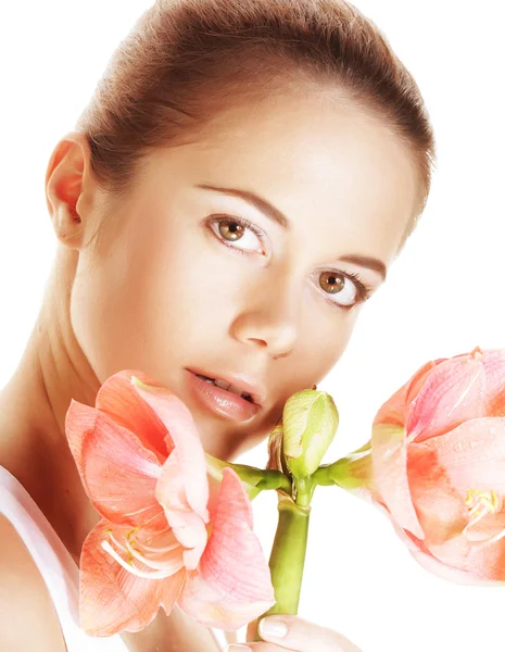 Beautiful woman holding pink flower — Stock Photo, Image