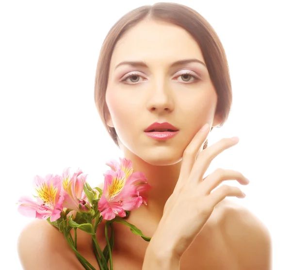 Hermosa mujer con flores rosadas —  Fotos de Stock