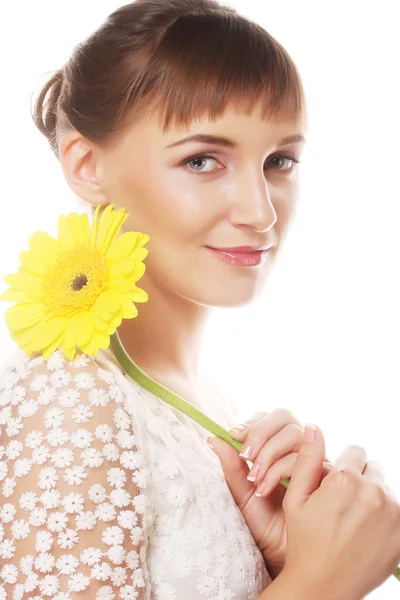 Beautiful young woman with gerber flower — Stock Photo, Image