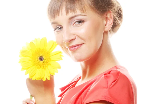 Mulher bonita com flor de gerber — Fotografia de Stock