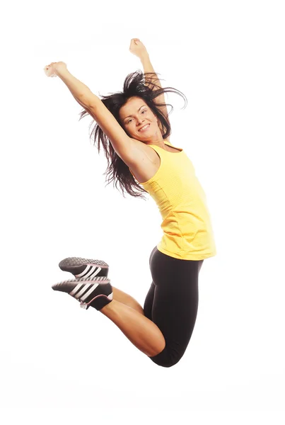 Fitness woman jumping of joy. — Stock Photo, Image