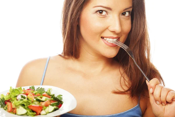 Young happy woman eating salad. — Stock Photo, Image