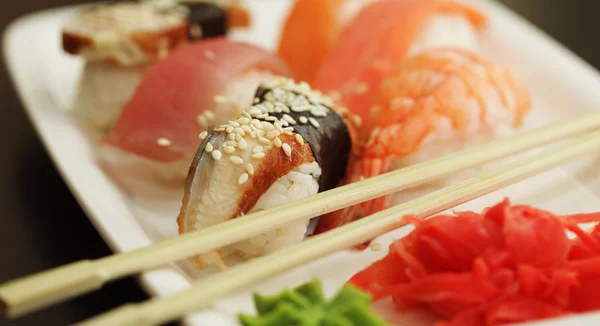 Sushi set on white plate — Stock Photo, Image