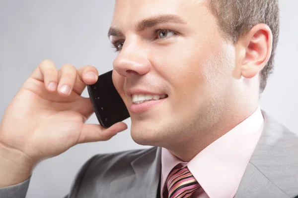 Young business man making a phone call — Stock Photo, Image
