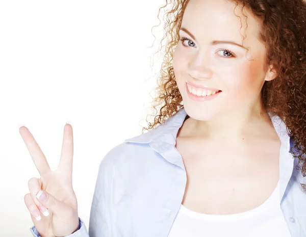 Young woman showing the sign of victory — Stock Photo, Image