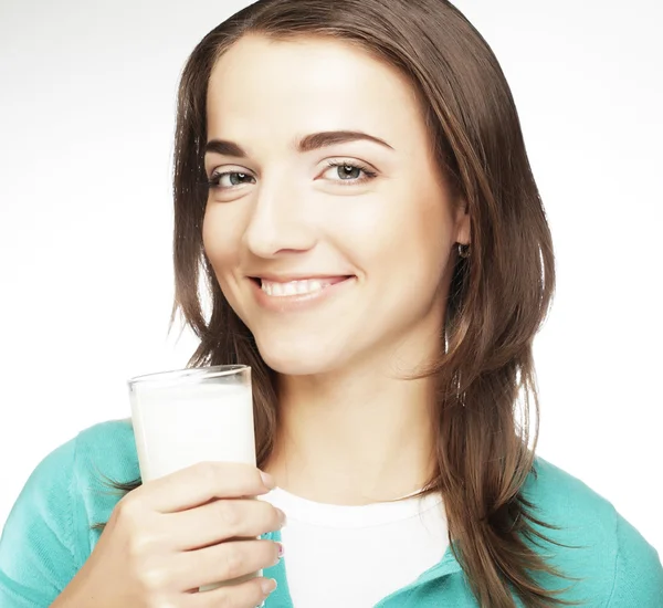 Young lady having a glass of milk Stock Photo