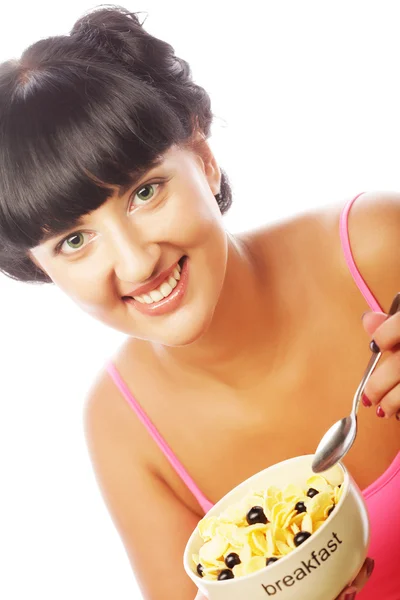 Sorridente donna mangiare muesli — Foto Stock