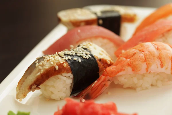 Sushi set on white plate — Stock Photo, Image