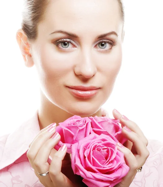 Mulher com rosas rosa — Fotografia de Stock