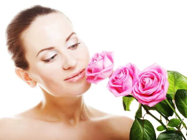 Woman with pink roses — Stock Photo, Image