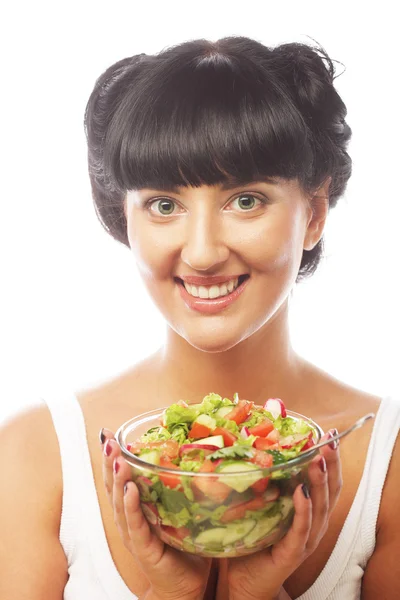 Jeune femme drôle manger de la salade — Photo