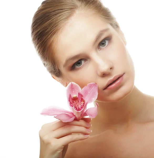 Beautiful woman with pink flower — Stock Photo, Image