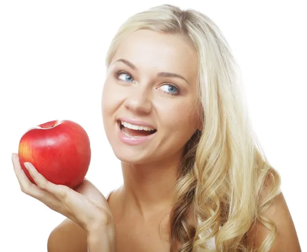 Smiling woman with red apple Royalty Free Stock Photos