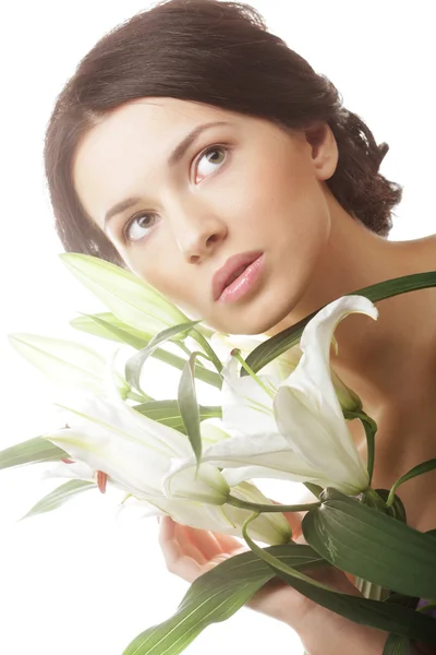 Woman with white lily flowers — Stock Photo, Image