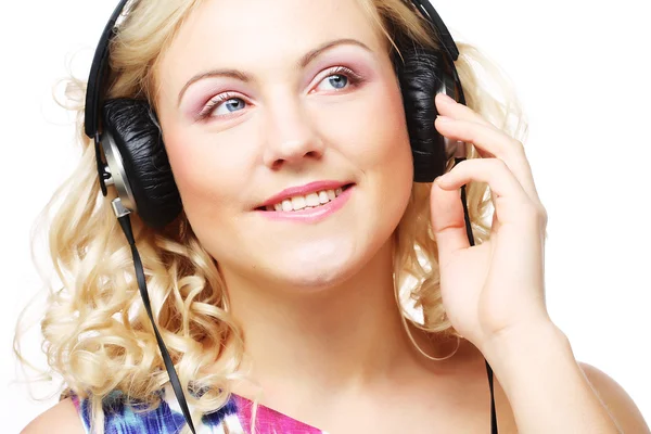 Linda mujer joven con auriculares —  Fotos de Stock