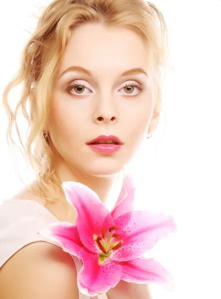 Woman with pink lily high-key portrait — Stock Photo, Image