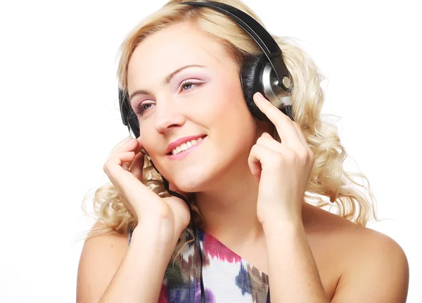 Cute young woman with headphones Royalty Free Stock Photos