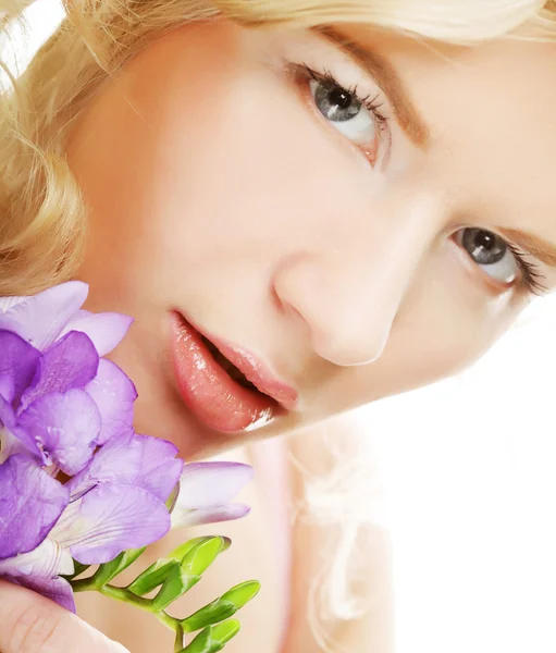 Beautiful woman with lilac flower — Stock Photo, Image