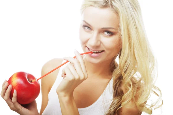 Femme souriante avec pomme rouge — Photo