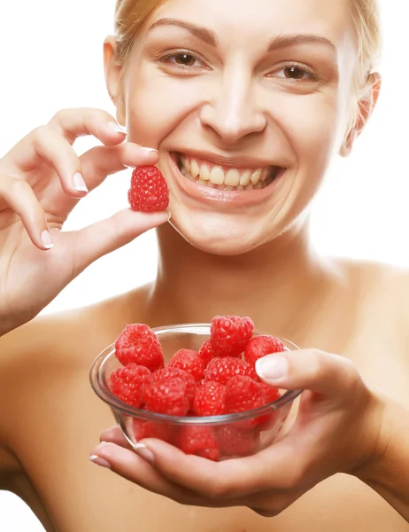 Blond woman with raspberries — Stock fotografie