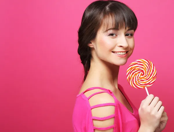 Pretty woman with lollipop — Stock Photo, Image