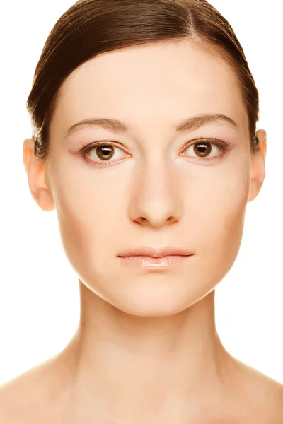 Vacker kvinna ansikte med ren hud — Stockfoto