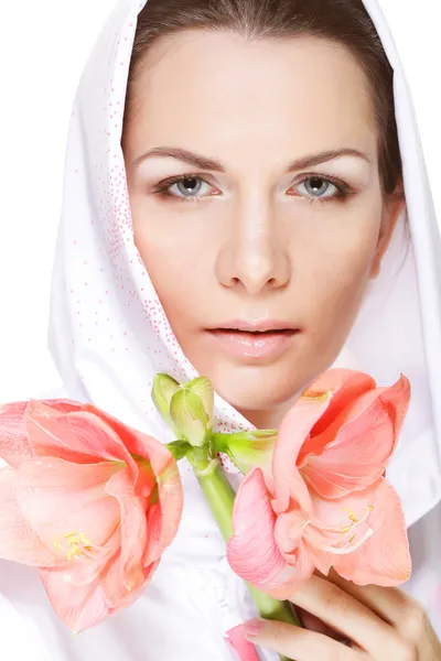 Beautiful woman holding pink flower — Stock Photo, Image