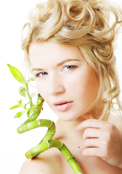 Beautiful woman with bamboo — Stock Photo, Image