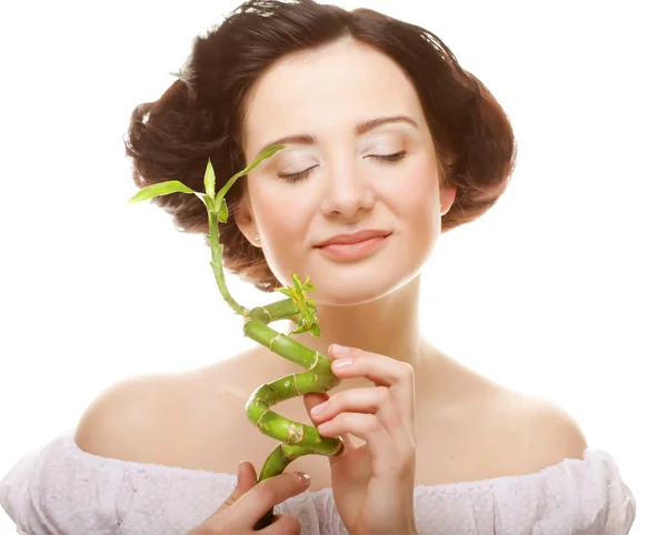 Young woman with bamboo. — Stock Photo, Image